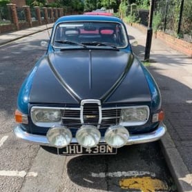 Old vehicle in London during a visit to investigate broadband incentives in the UK.